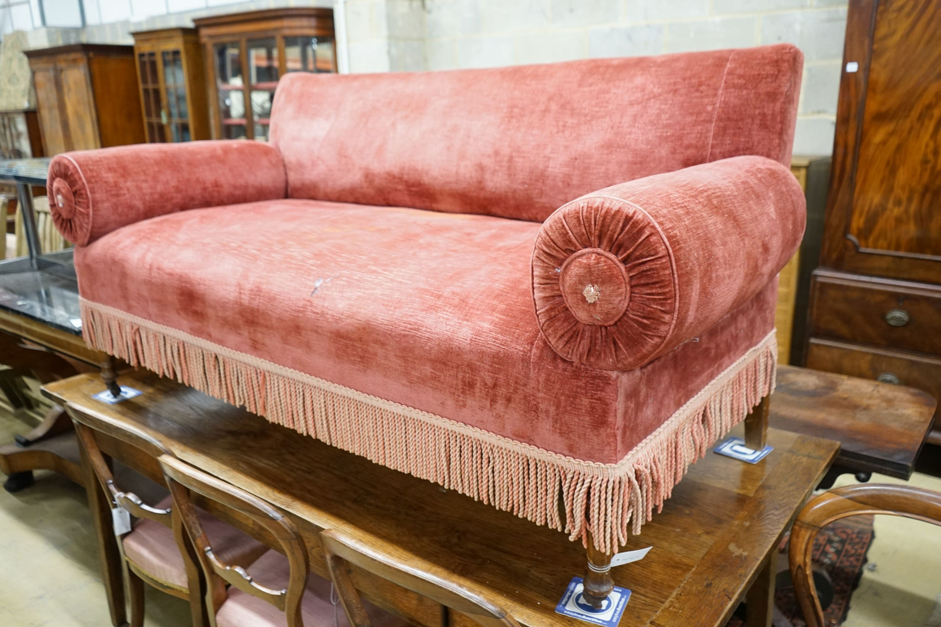 A 19th century Continental upholstered double drop arm settee, length 160cm, depth 74cm, height 84cm